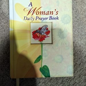A woman's daily prayer book